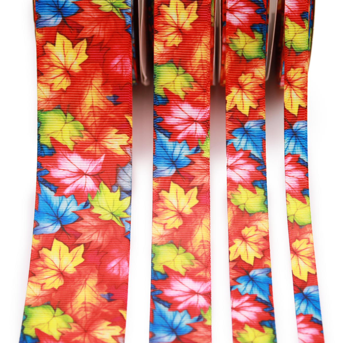 Fall Leaves printed grosgrain ribbon with colorful red, orange, yellow, green and blue autumn leaves.