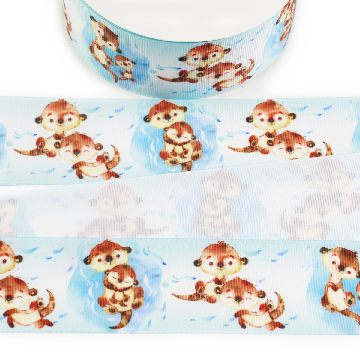 Otter printed grosgrain ribbon featuring cute watercolor brown otters playing and cuddling on a soft aqua blue water background.
