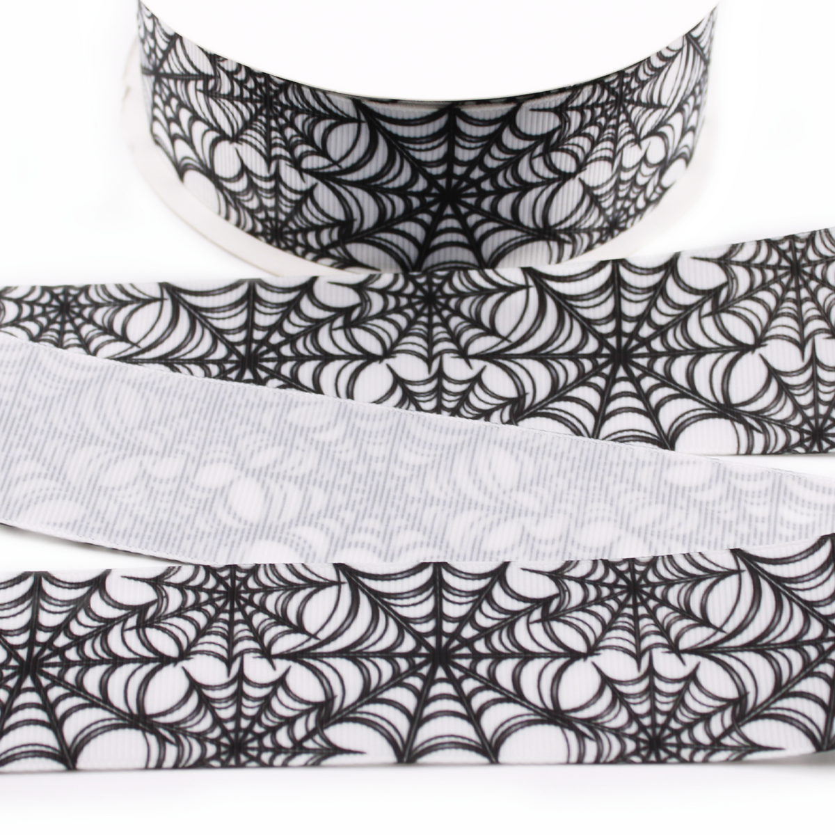 Spider Web printed grosgrain ribbon with detailed black spiderwebs on a white background.