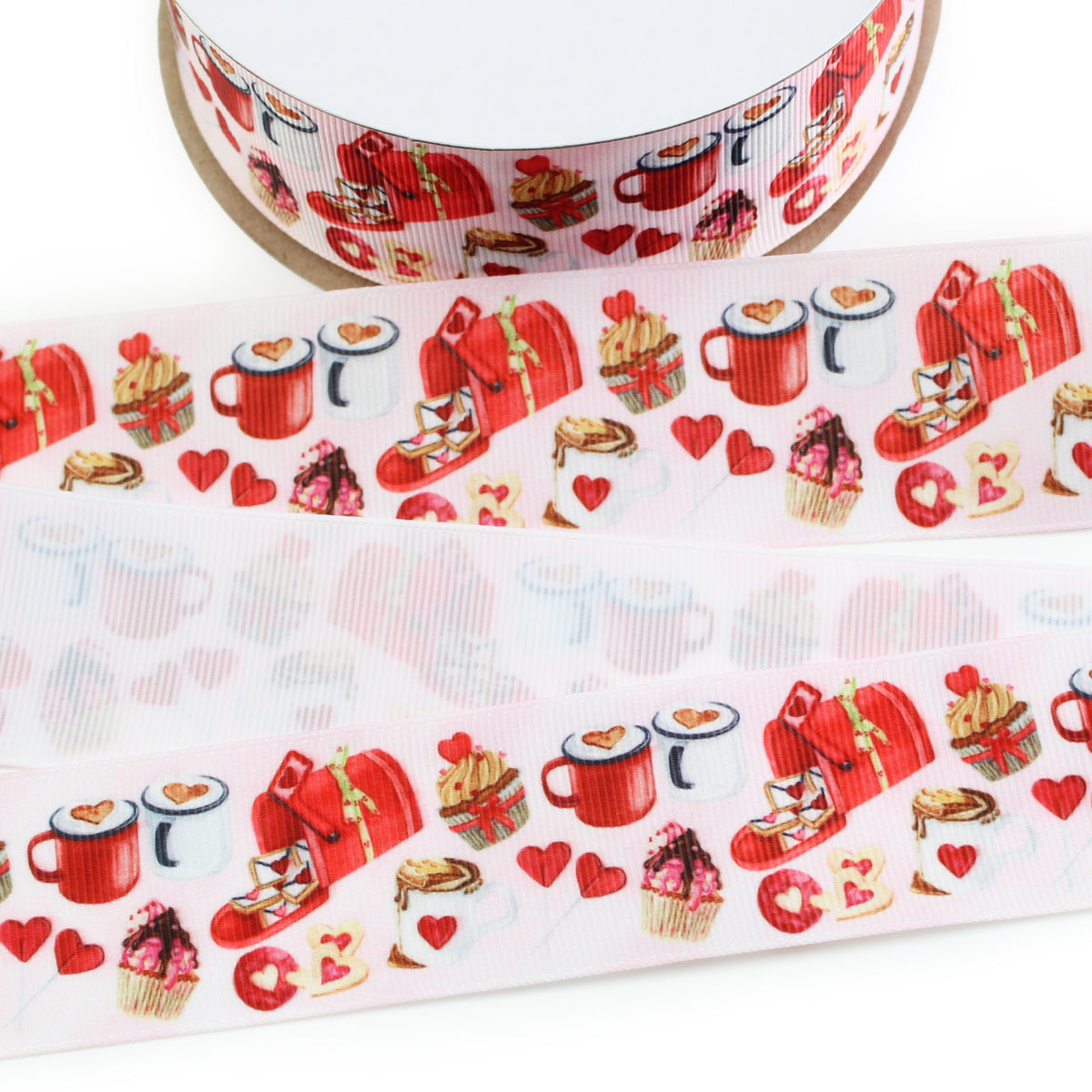 Light pink grosgrain ribbon featuring Valentine's Day illustrations of red sweaters, cozy slippers, coffee mugs, cupcakes, heart-shaped cookies, and red hearts.