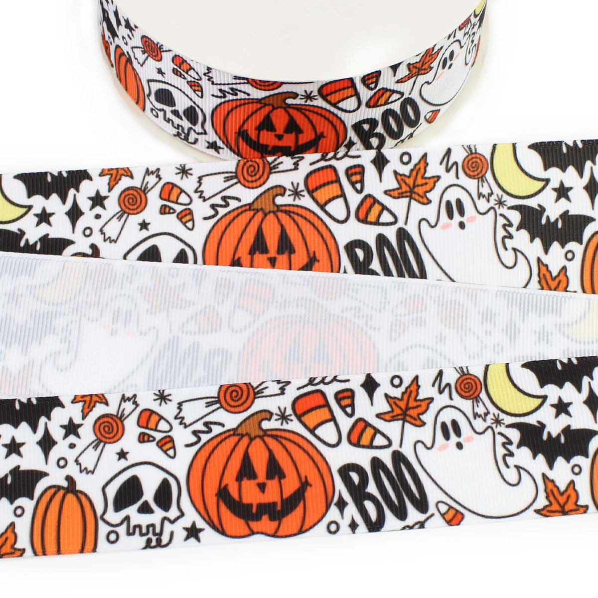 Halloween printed grosgrain ribbon with orange pumpkins, ghosts, skulls, bats, candy corn and moons on a white background.