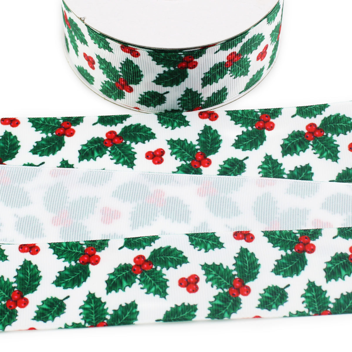 Christmas holly printed grosgrain ribbon featuring green holly leaves and bright red berries scattered across a white background.