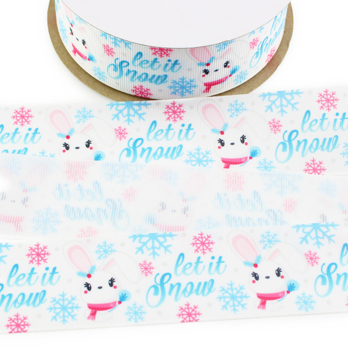 Let It Snow printed grosgrain ribbon with a white winter bunny, pink scarf, blue earmuffs and pink and blue snowflakes on a white background.