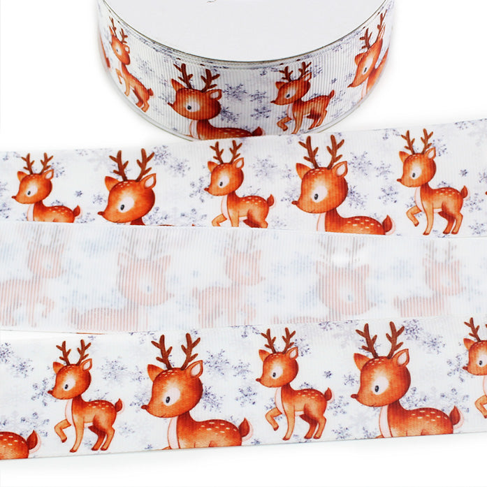 Christmas reindeer printed grosgrain ribbon featuring cute watercolor-style brown deer with antlers and delicate snowflakes on a white background.