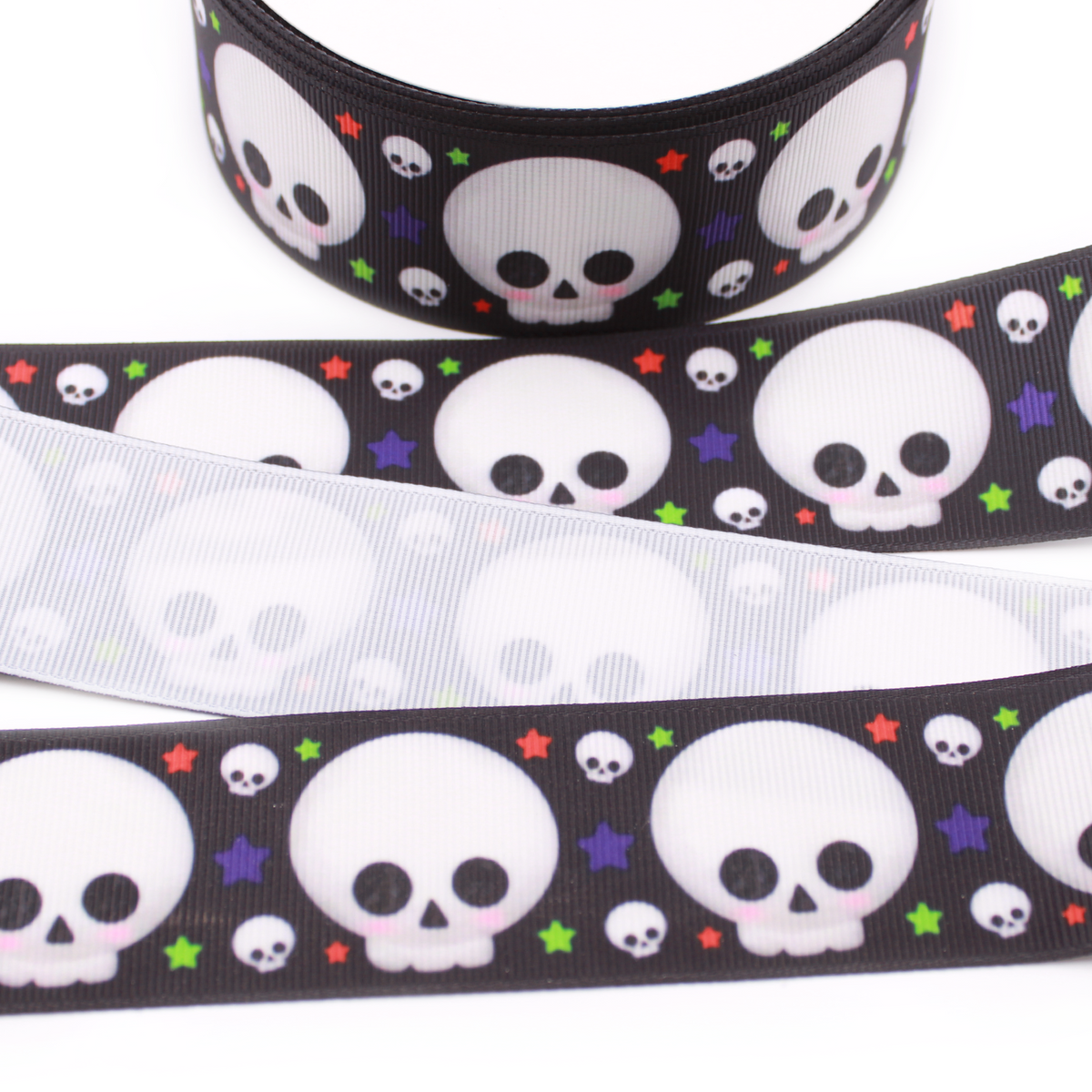 Skullz printed grosgrain ribbon with cute white skulls, colorful stars on black background