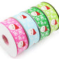 Santa Ho Ho Ho printed grosgrain ribbon with smiling Santa faces, white snowflakes and holiday lettering in pink, blue and green color options.