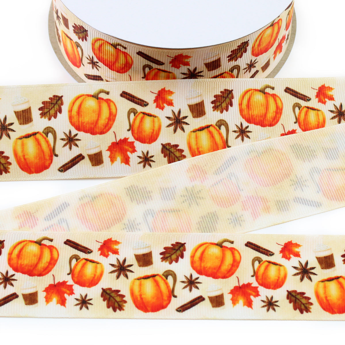 Pumpkin spice printed grosgrain ribbon with orange pumpkins, fall leaves, cinnamon sticks and autumn details on a cream background