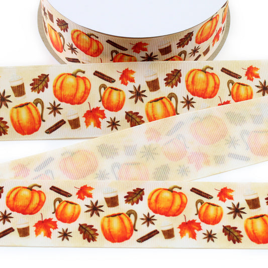 Pumpkin spice printed grosgrain ribbon with orange pumpkins, fall leaves, cinnamon sticks and autumn details on a cream background